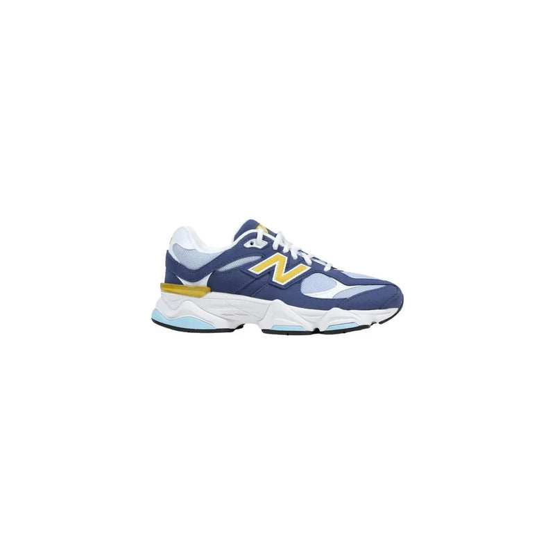 New balance women purple suede sneakers in navy blue and white with bold yellow n logo on the side