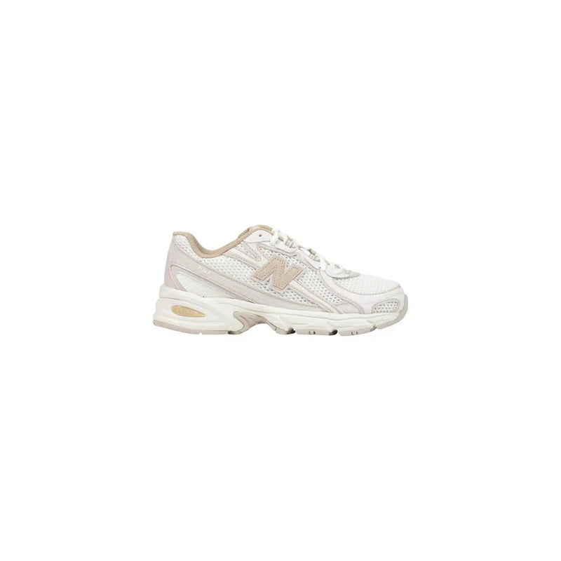 White new balance 520 women running sneaker with beige synthetic accents and breathable mesh upper for sporty use