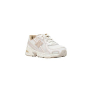 White new balance women running sneaker with beige synthetic accents and mesh upper for sporty use