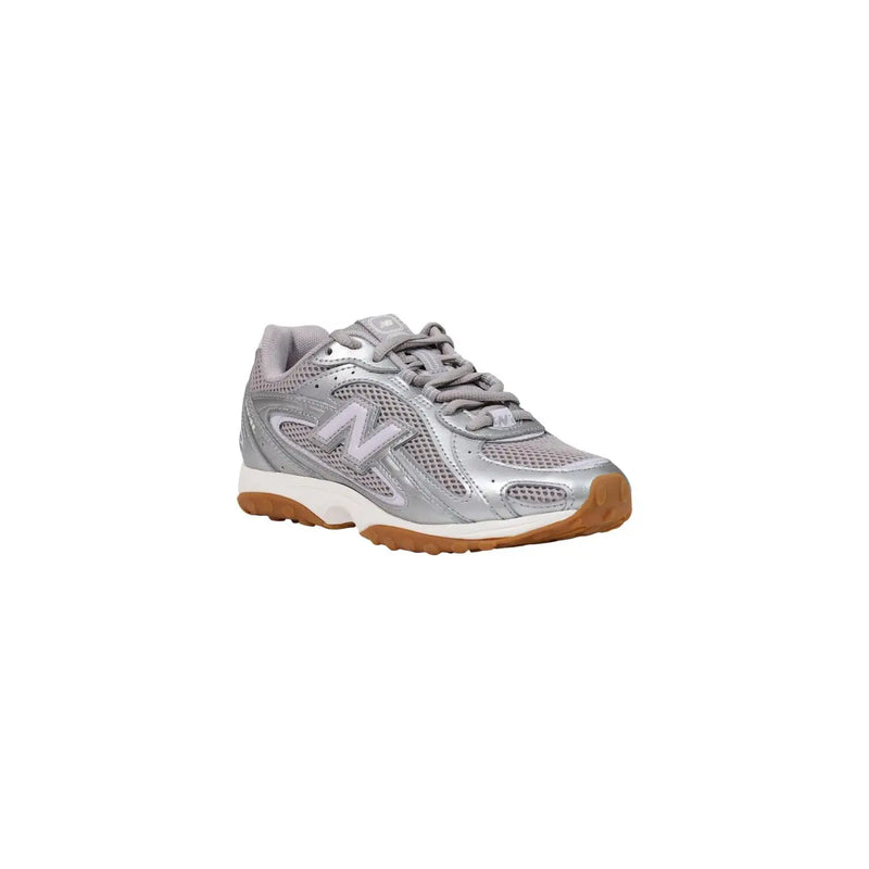 New Balance women silver sneakers synthetic slip with mesh upper and gum-colored rubber sole athletic shoe