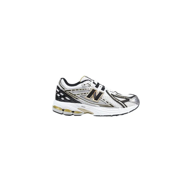 New Balance women silver synthetic sneakers in white and black with silver accents and visible air cushioning unit