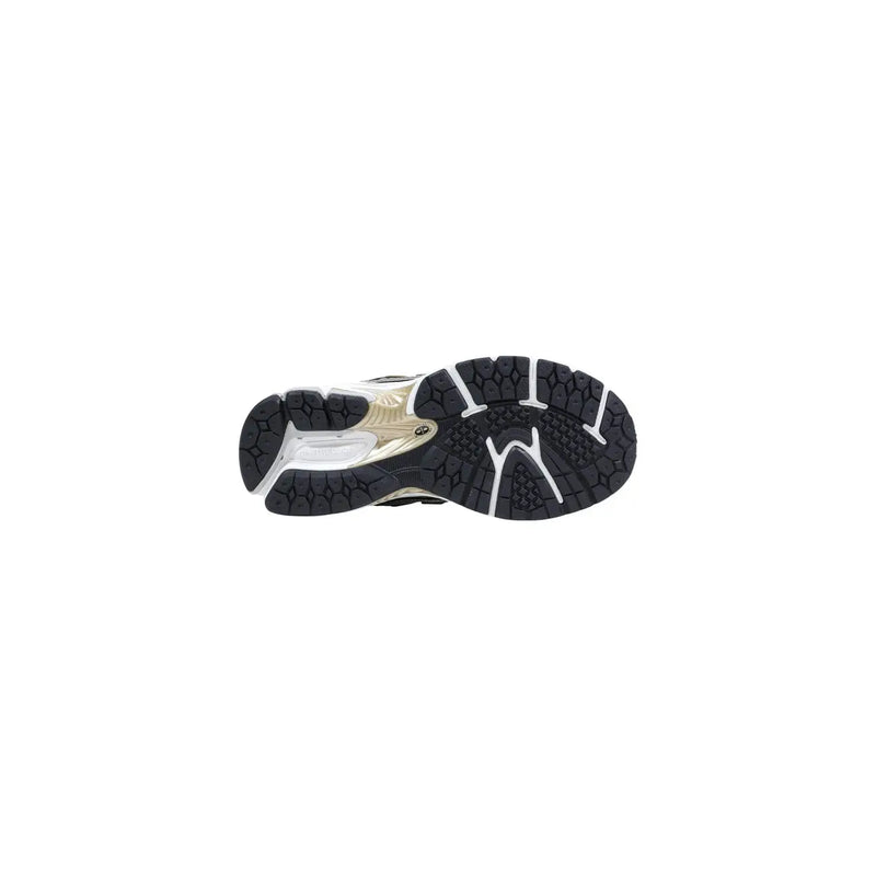 New balance women silver synthetic sneakers black and white athletic shoe with gold midsole accent front view