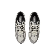 New Balance women silver textile slip on skate sneakers with white and black mesh uppers and silver accents