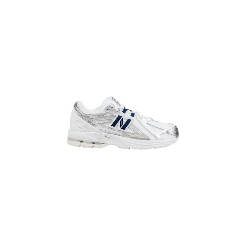 New Balance women sneakers white synthetic lace up running shoe with silver accents and navy blue branding