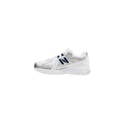 New Balance women sneakers white synthetic lace up running shoe with silver accents and navy blue branding