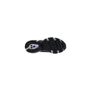 Back view of new balance women synthetic sneakers black showing a black and white sole with blue heel accent