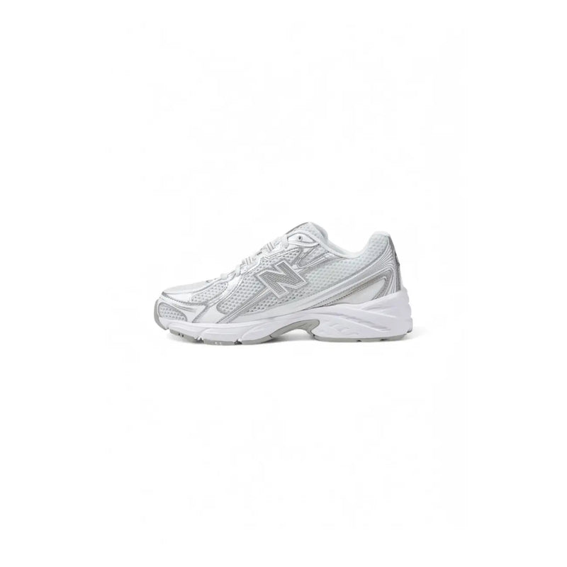 New Balance women white faux leather sport sneakers with silver mesh upper and chunky sole for running