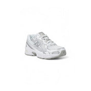 New Balance women white and silver sport sneakers with mesh upper and rubber sole for running and casual wear