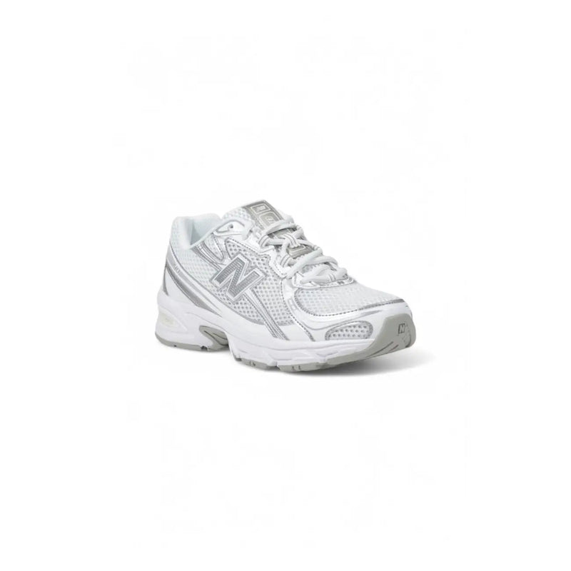 New Balance women white and silver sport sneakers with mesh upper and rubber sole for running and casual wear