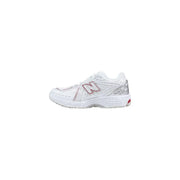 New Balance women white synthetic sneakers with silver and pink accents designed for running and casual wear