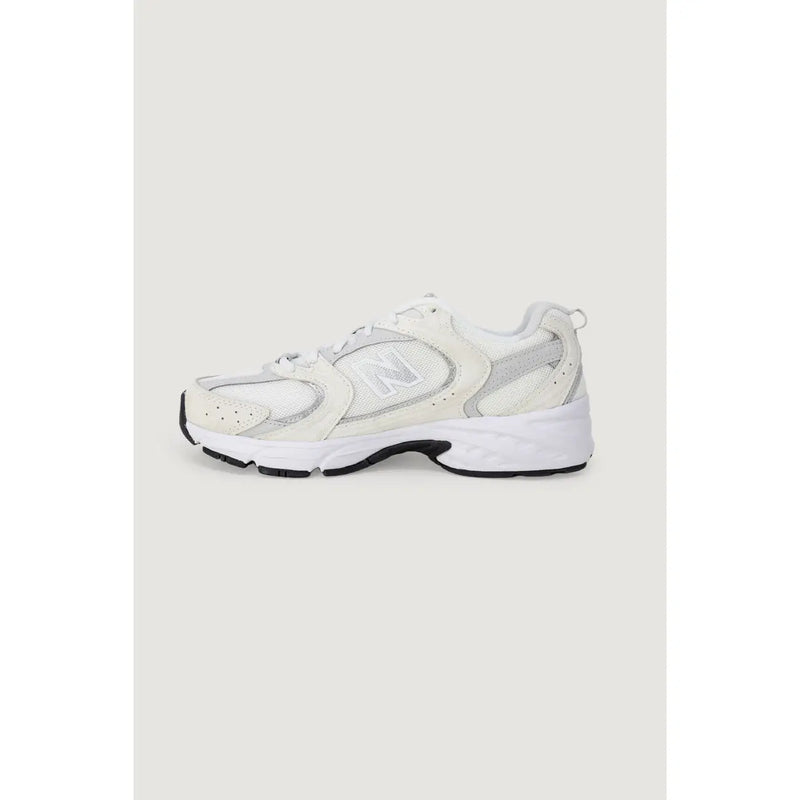 New Balance women white synthetic sneakers with mesh and synthetic overlays and chunky white sole with black accents