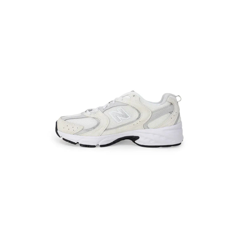 New Balance women white synthetic sneakers with mesh and synthetic overlays and chunky white sole with black details