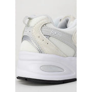 New Balance women white synthetic sneakers with mesh and suede panels cushioned midsole featuring air unit