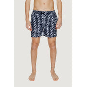 Navy blue Nike men’s swim trunks with white wavy pattern black drawstring waistband made of 100% polyester