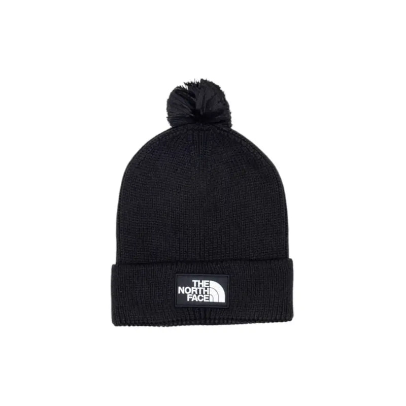 Black beanie with pom-pom and logo, the north face brand.