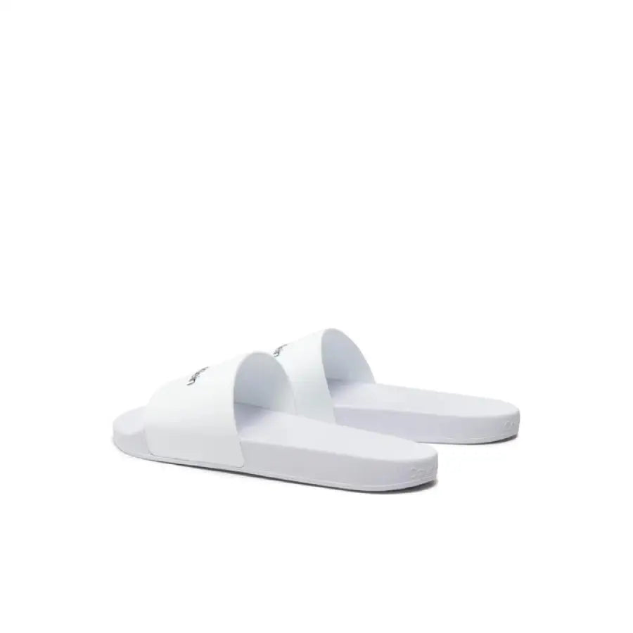 
                      
                        Calvin Klein Men Slippers in Sand White featuring The North Face logo, urban style
                      
                    