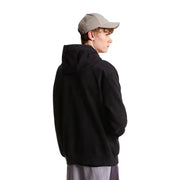 Schwarzer Herren-Hoodie aus Baumwollfleece von The North Face mit lockerer Passform und gerippten Bündchen, von der Rückseite gesehen