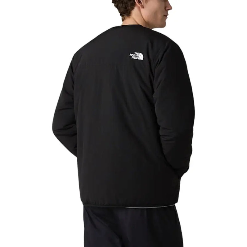 Schwarzer The North Face Herrenblazer aus Nylon mit weißem Logo auf der Rückseite und Reißverschluss