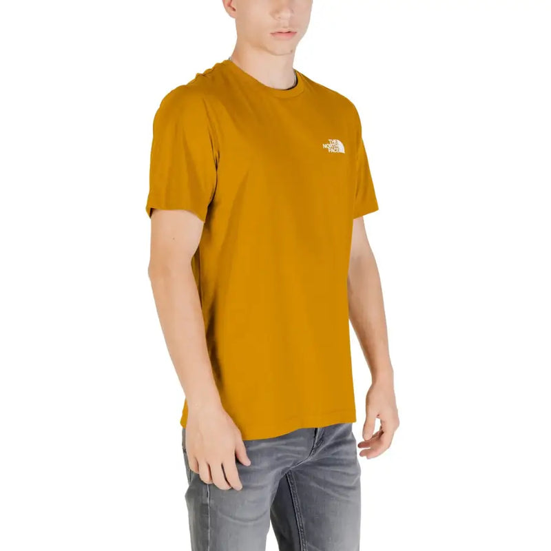 Men’s mustard yellow short-sleeve T-shirt with white logo from The North Face