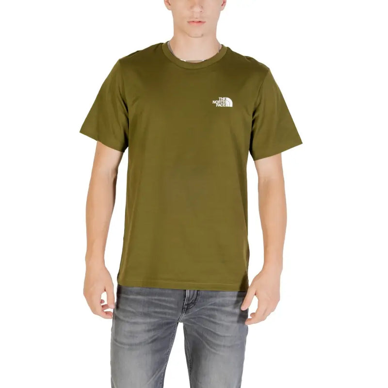 Men’s olive green short-sleeve T-shirt with small white logo, paired with gray jeans