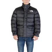 Schwarze Herrenjacke von The North Face aus Polyester mit langem Rollkragen, Steppmuster und Logo auf der Brust.