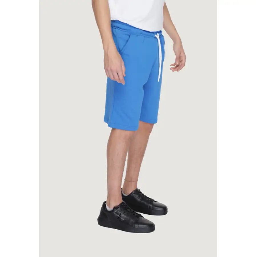 
                      
                        The North Face Men’s Icon Shorts in urban city style fashion
                      
                    