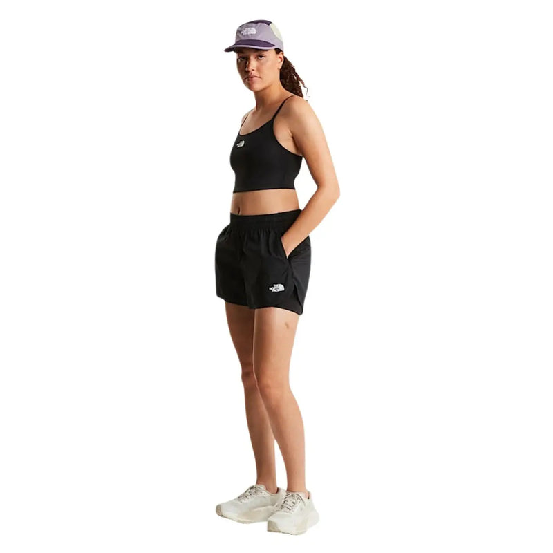 The North Face women black polyester athletic shorts with a white logo on the left leg front side