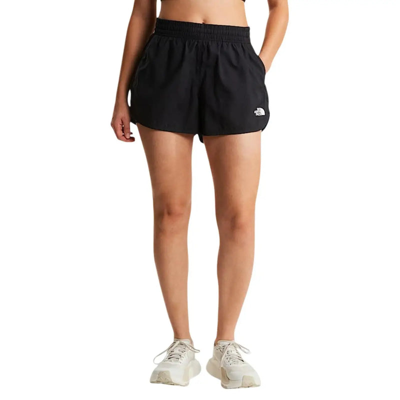 The North Face women black polyester shorts feature a white logo on the left leg in a sleek athletic design