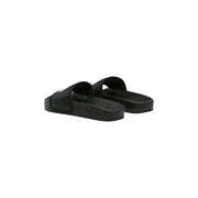 The North Face women slip on slide slippers black rubber with minimalist design and subtle white logo on the side