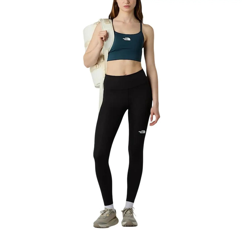 Schwarze Leggings mit hohem Bund und weißem Logo am linken Oberschenkel aus Polyester-Elastan von The North Face (Damenhose)