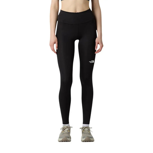 Schwarze, hochgeschnittene Damenhose von The North Face aus Polyester-Elastan mit weißem Logo am linken Oberschenkel