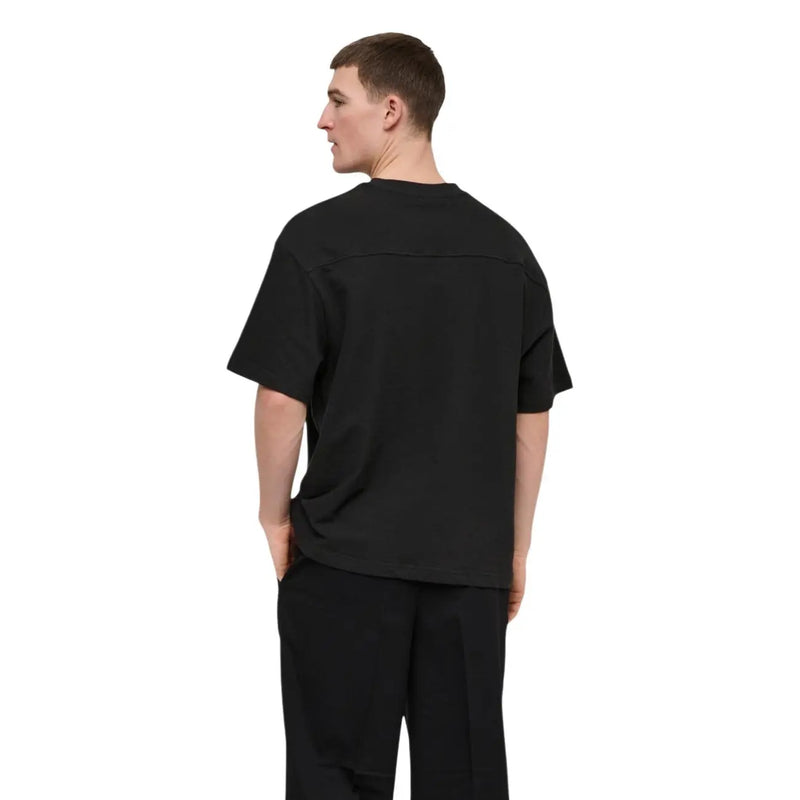 Black oversized short-sleeved t-shirt with relaxed fit and subtle seam detailing by Only & Sons men t-shirt