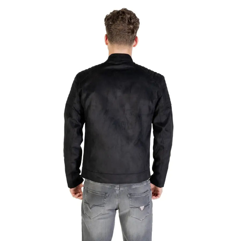 Men’s black faux leather blazer with mandarin collar paired with gray jeans