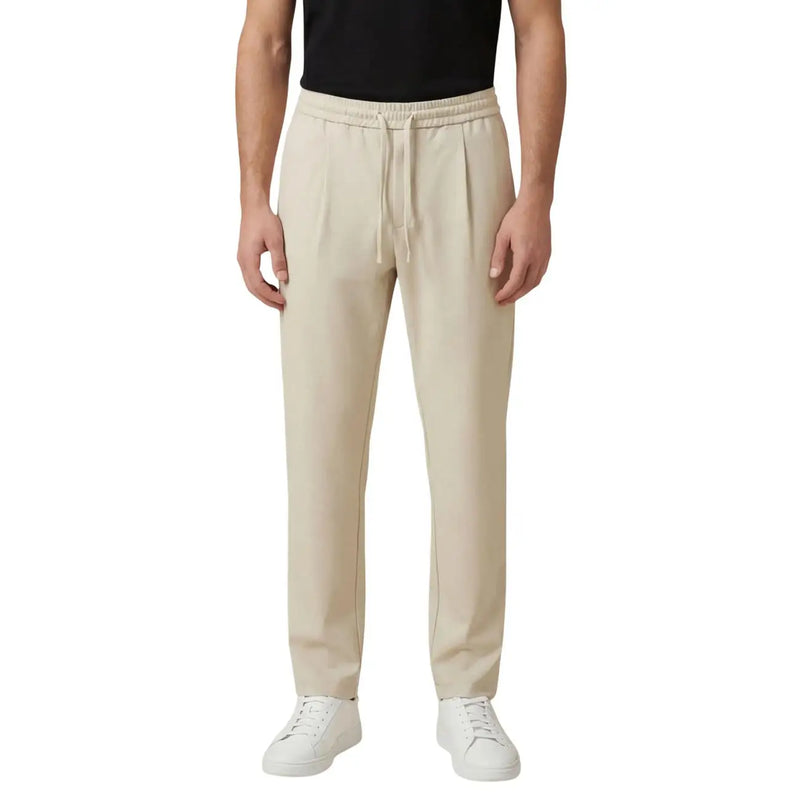 Beige pleated men trousers by Only & Sons with elastic waistband and drawstring for comfortable fit