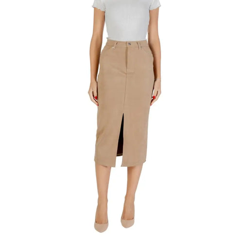 Woman in white top and beige midi skirt with front slit from Only Women collection