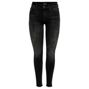 Schwarze, hochgeschnittene Skinny-Jeans mit verwaschenem Look und ausgefransten Säumen aus einem Baumwollmischgewebe von Only Frauen von hinten gesehen