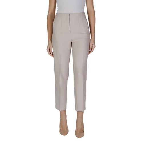 Beige high-waisted tailored trousers by Only Women with straight-leg cut zip front pockets and subtle front pleats