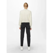 Cream-colored long-sleeved knit sweater with textured pattern featuring v neck and button detail in acrylic material