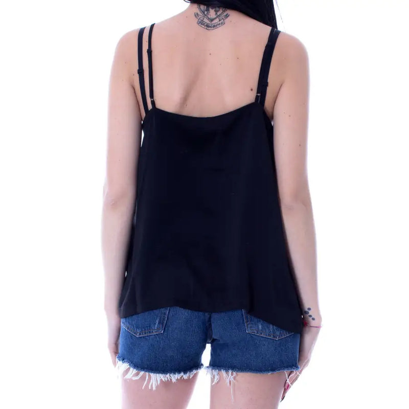 Only women’s black sweetheart neckline tank top with spaghetti straps and flowing silhouette for spring wear