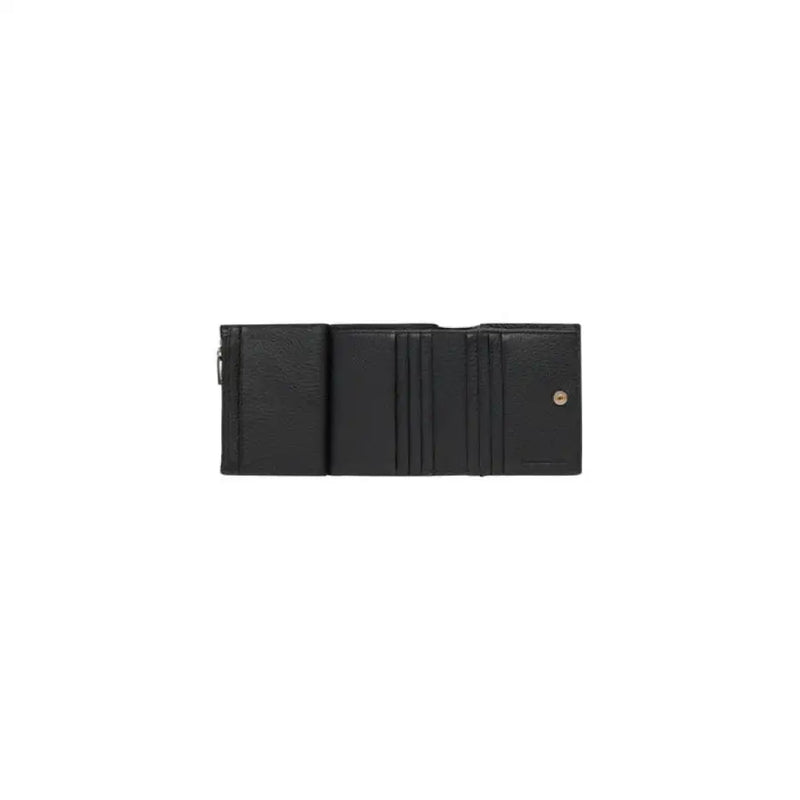 Open black leather wallet from Calvin Klein featuring textured leather surface