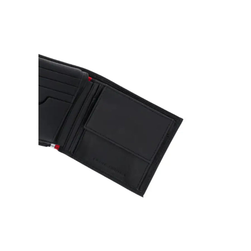 Open black leather wallet showing multiple card and cash compartments