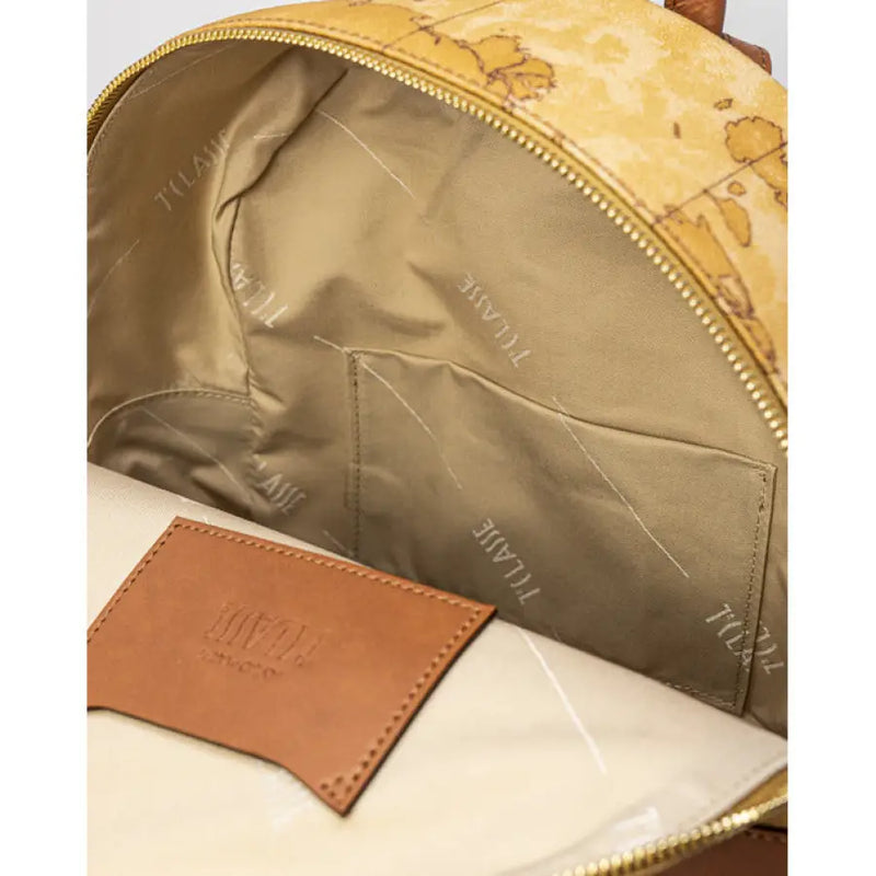 Open tan World Map Patterned Backpack interior with brown leather straps