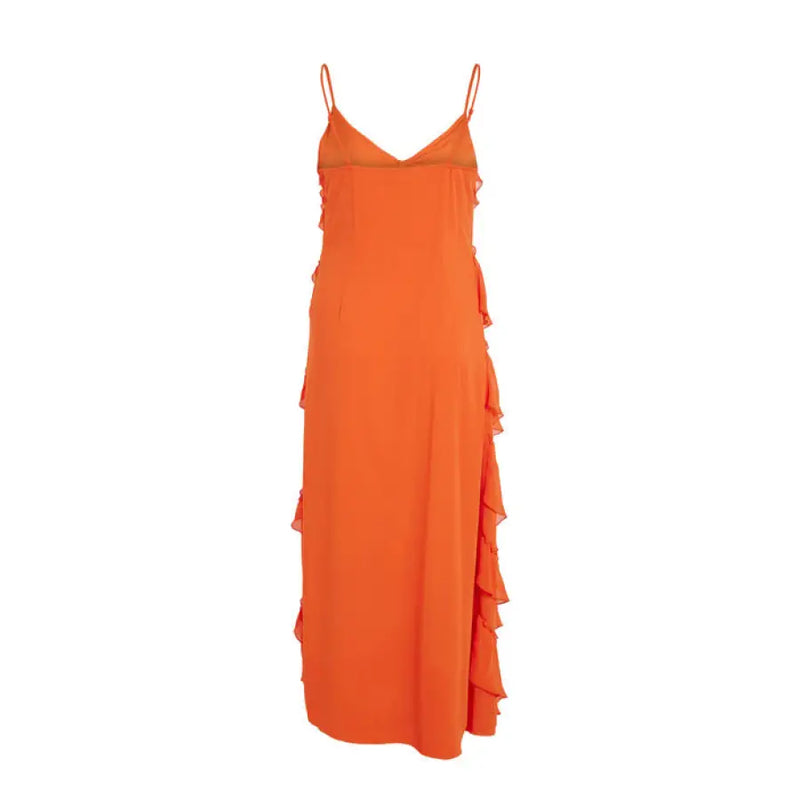 Orange ruffled spaghetti strap maxi dress displayed on a mannequin with flowing ruffles