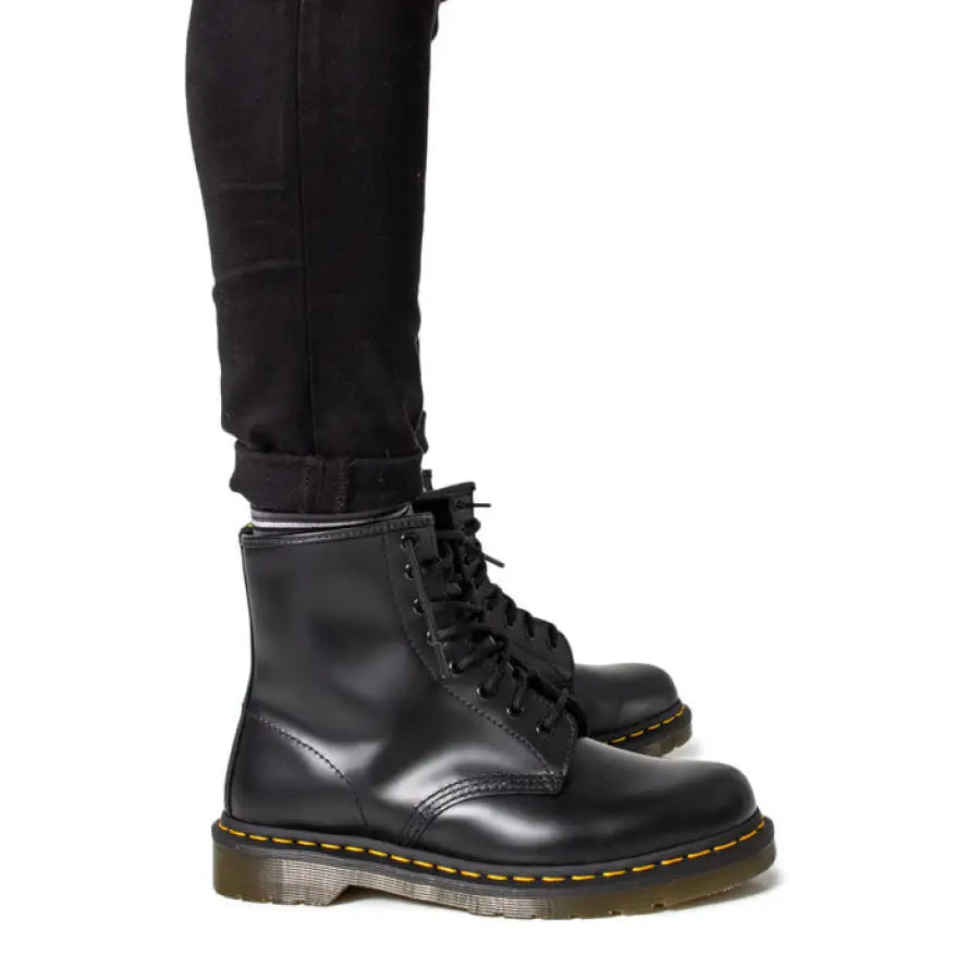 Black Dr. Martens boots with white sole for urban style clothing and city fashion