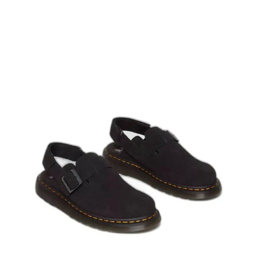 Black Dr. Martens sandals showcasing urban city fashion with a white background