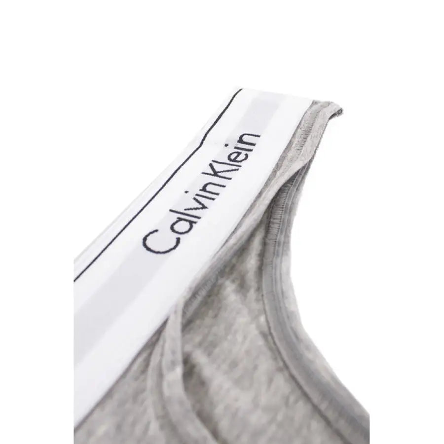 
                      
                        Calvin Klein Underwear pair of grey and white socks with Calvin branded on them
                      
                    