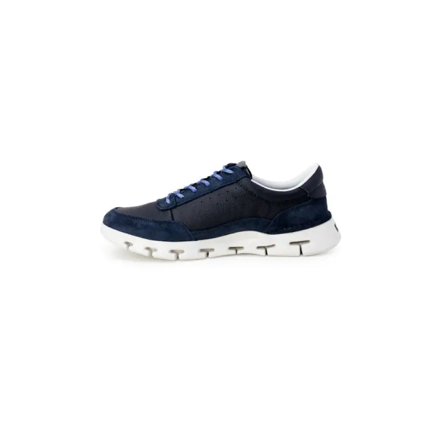 Clarks Men Sneakers showcasing urban city style with blue and white sole