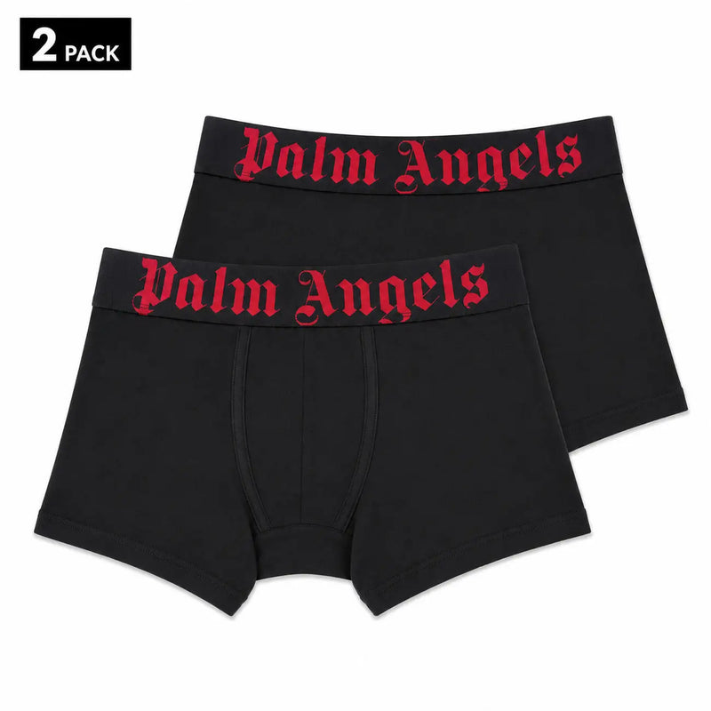 Schwarze Boxershorts mit Palmenengeln-Motiv und roter gotischer Schrift am Bund, aus grünem, dehnbarem Baumwollunterwäsche