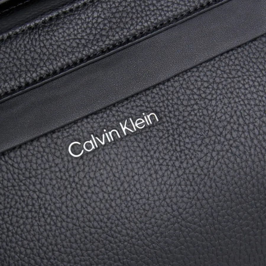 
                      
                        Calvin Klein Men Bag in Black Leather - Urban Style Clothing Accessory
                      
                    