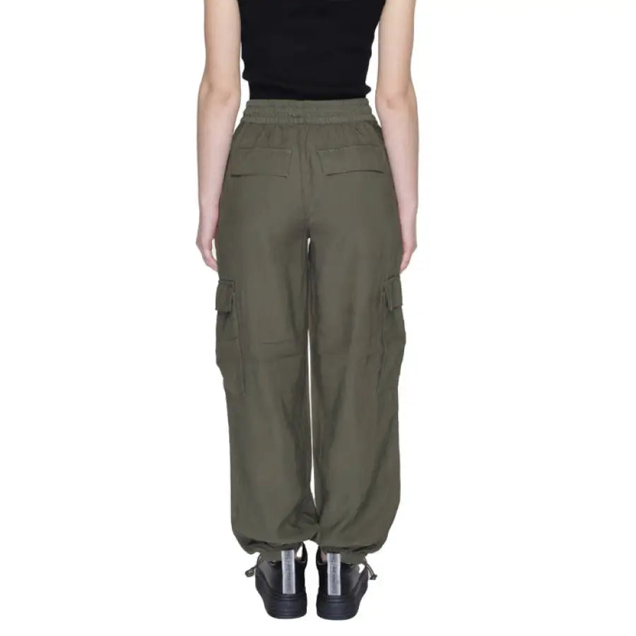 Person wearing Only urban style cargo pants for women in an urban city fashion setting